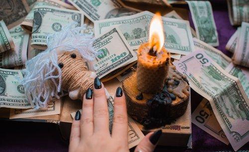 Ritual and spell for attracting money, pagan magic and fate prediction, work of witch, occultism